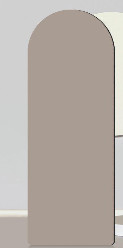 Tapis de yoga en caoutchouc naturel, vue partielle montrant sa texture beige-brun et ses coins arrondis.