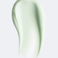 Crème hydratante anti-acné : texture légère et pastel vert pâle en mouvement fluide sur fond blanc.